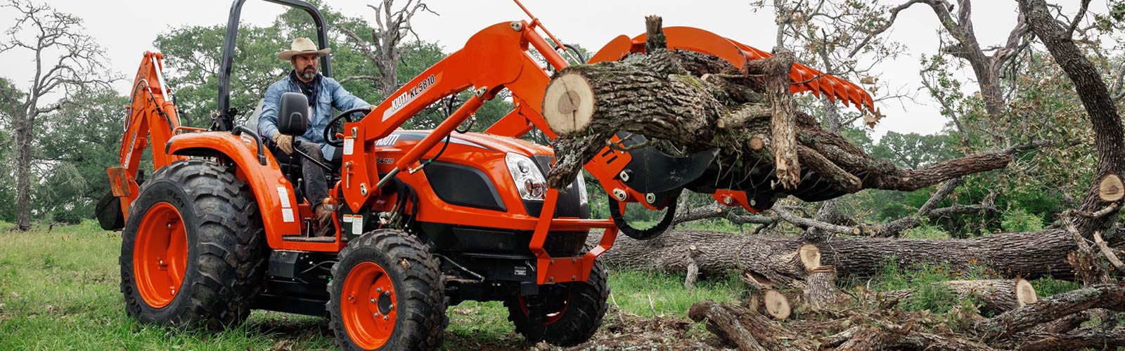 Kioti tractor with Grapple attachment